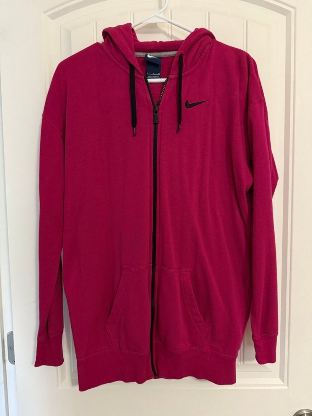Small magenta zip up Nike hoodie